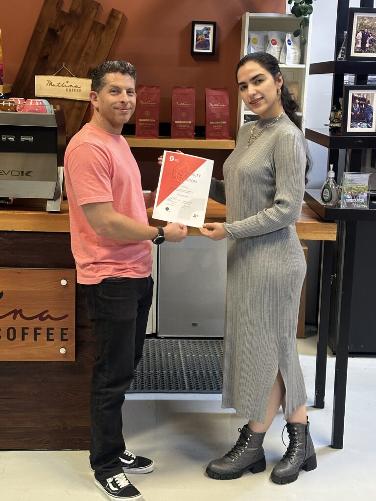 Luis Alvarado, SCA graduate, with Maryam Tabatabaei